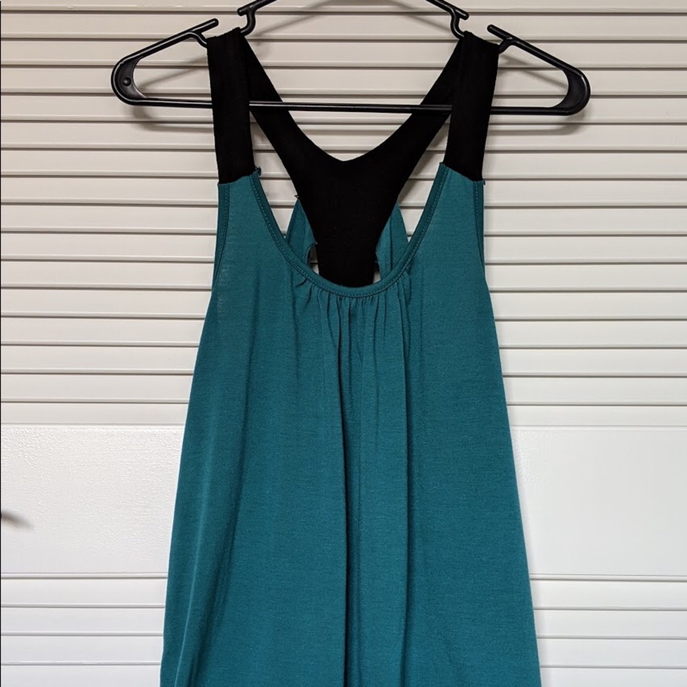 Teal and black tank top